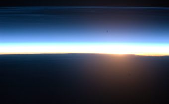 Polar Mesospheric Clouds at Orbital Sunrise (NASA, International Space Station Science, 06/16/10)